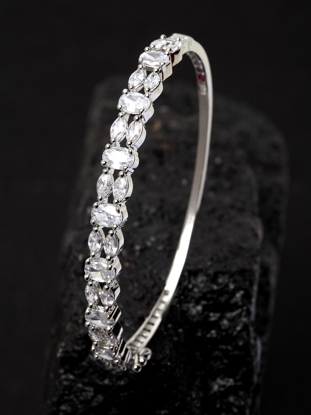 

ANIKAS CREATION Silver-Plated & White AD Studded Handcrafted Bangle Style Bracelet