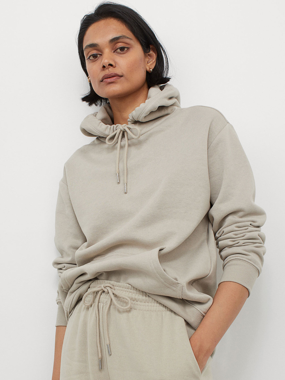 

H&M Women Beige Solid Hooded top