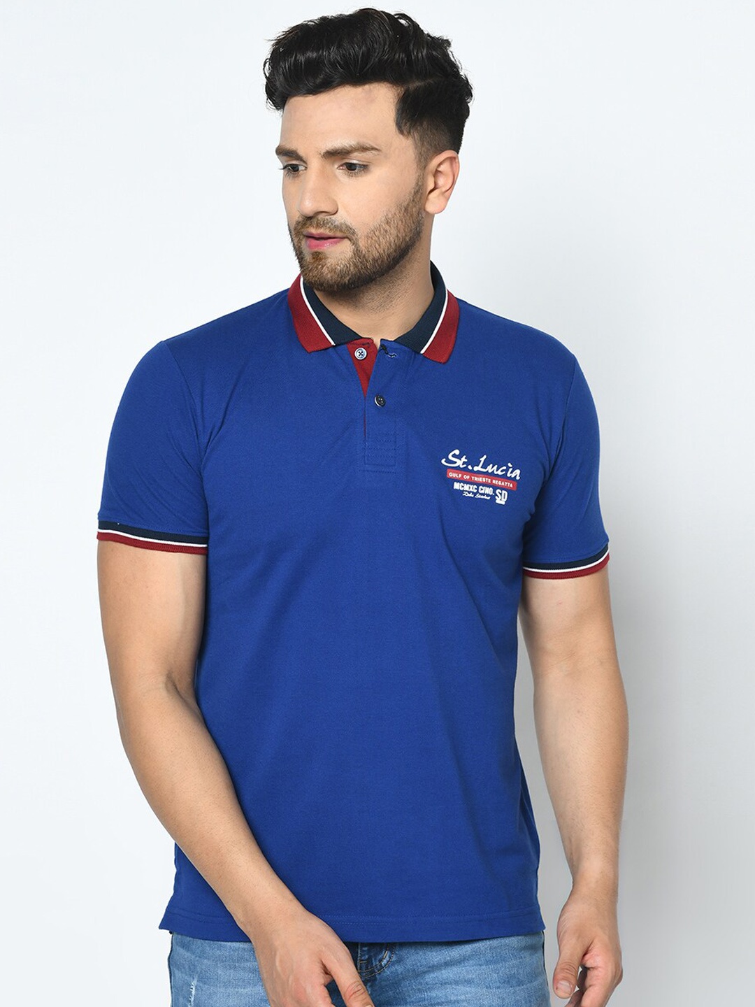 

Duke Men Blue Solid Polo Collar T-shirt