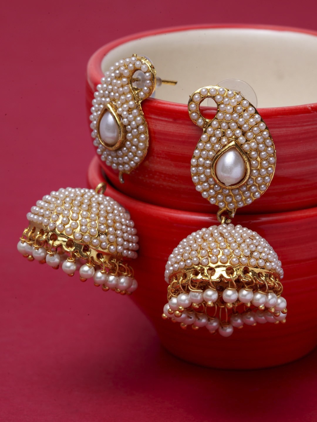

ANIKAS CREATION Off-White & Gold-Plated Contemporary Jhumkas