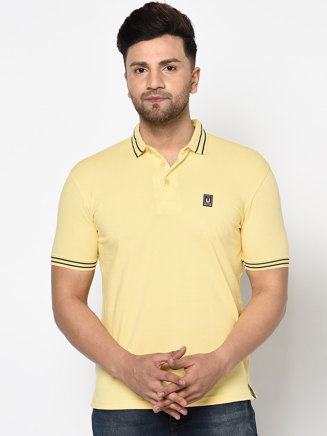 

Duke Men Yellow Solid Polo Collar T-shirt