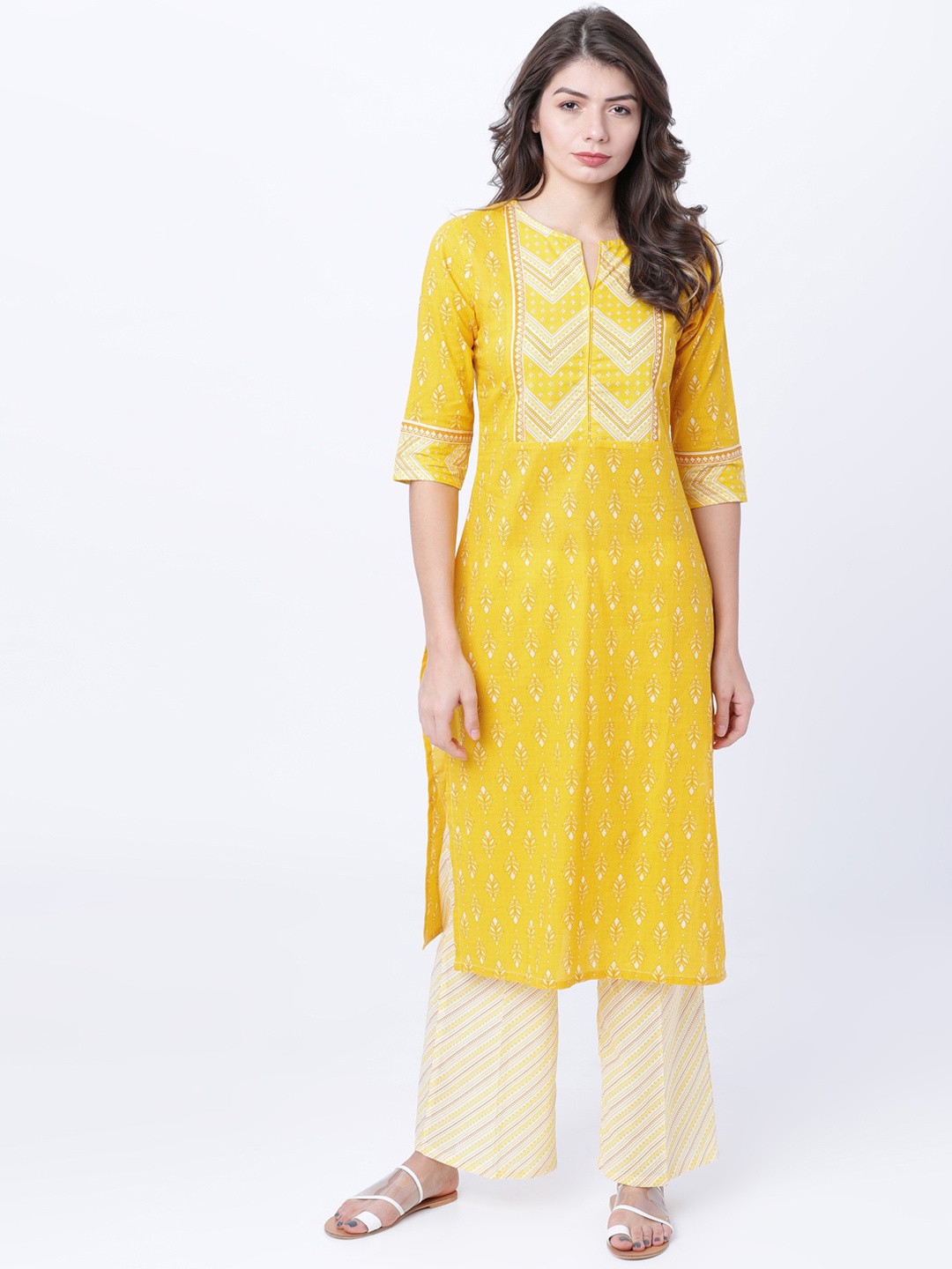 

Vishudh Women Yellow Printed Straight Kurta