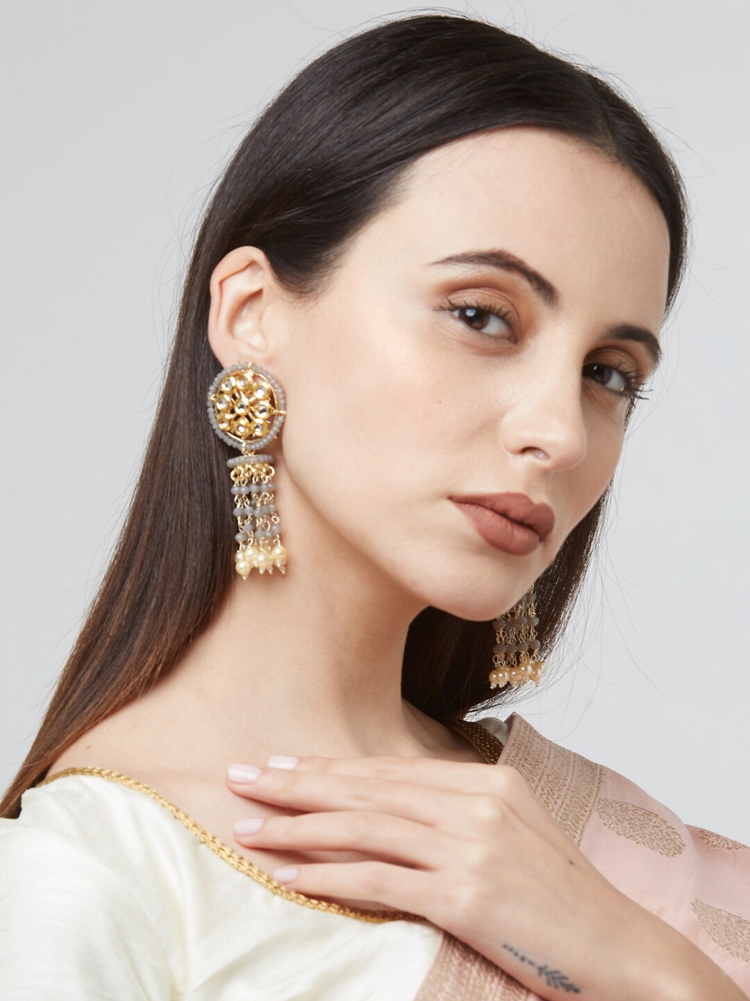 

Fida Gold-Plated & Grey Kundan Studded Contemporary Jhumkas