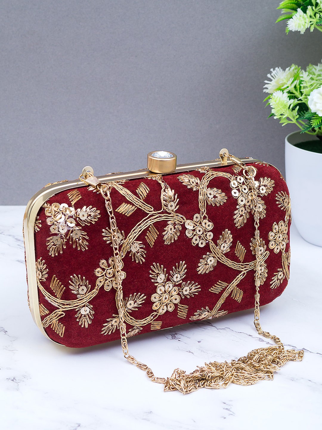 

Golden Peacock Women Maroon & Gold-Toned Embroidered Clutch