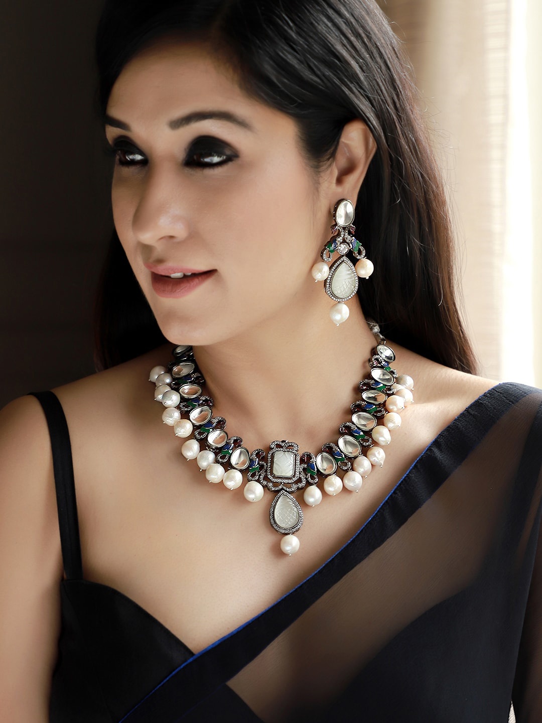 

Rubans Silver-Plated White & Green Kundan & Stone-Studded Beaded Handcrafted Jewellery Set