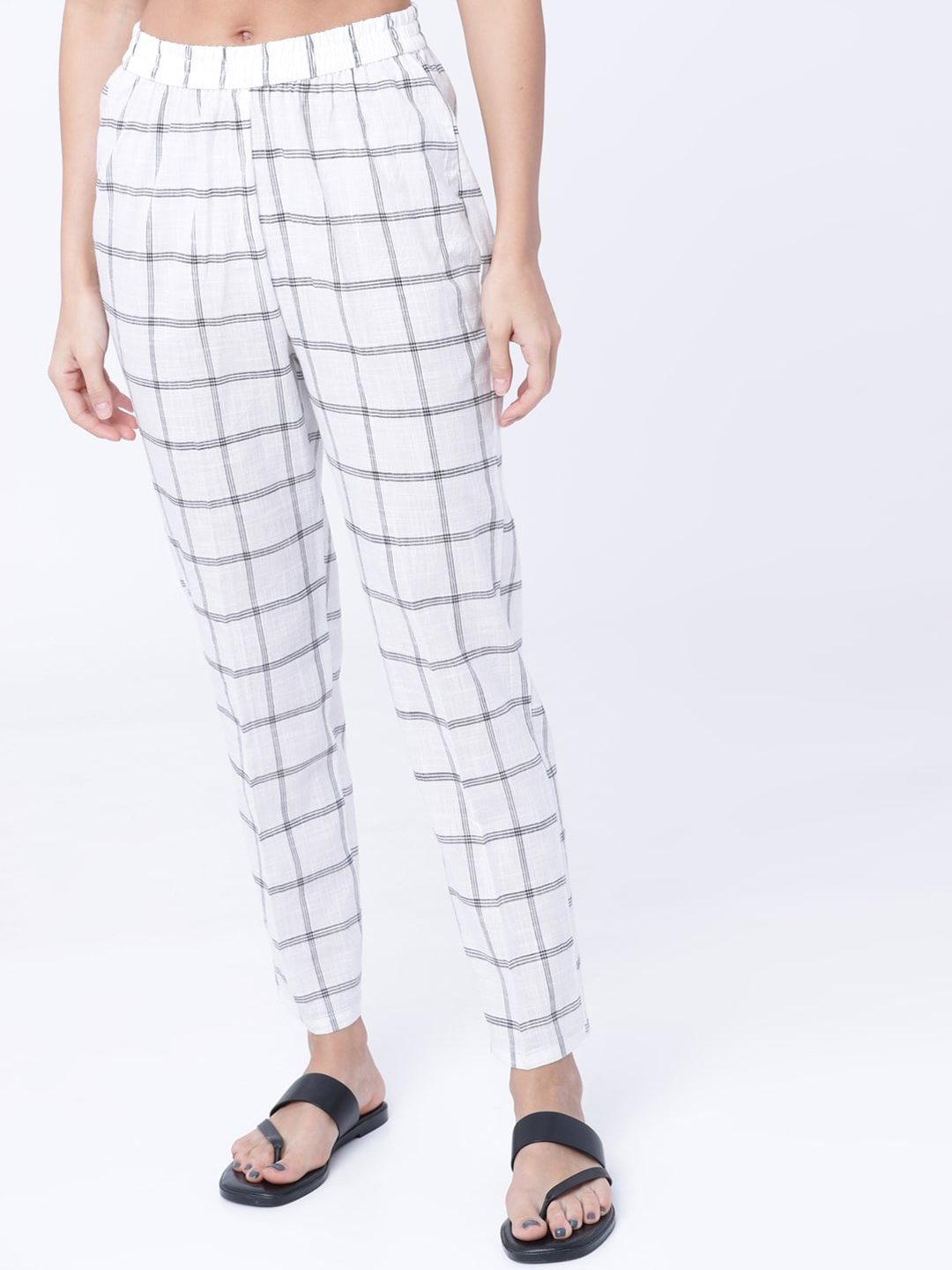 

Vishudh Women White & Black Regular Fit Checked Regular Trousers