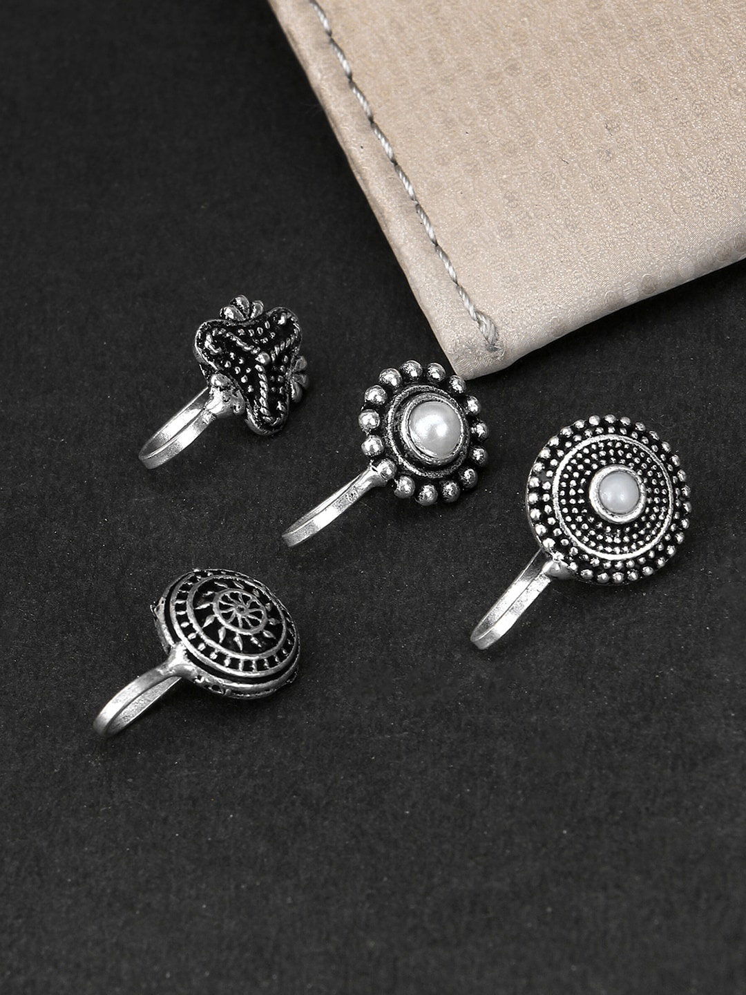 

Adwitiya Collection Set of 4 Oxidised Silver-Plated Clip-On Nosepins