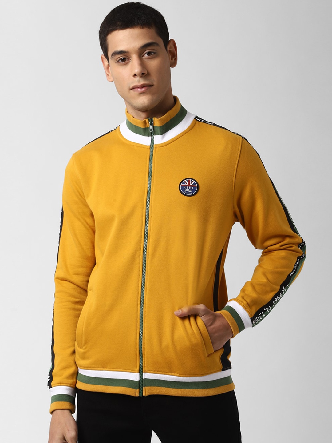 

Peter England Casuals Men Yellow Solid Sweatshirt
