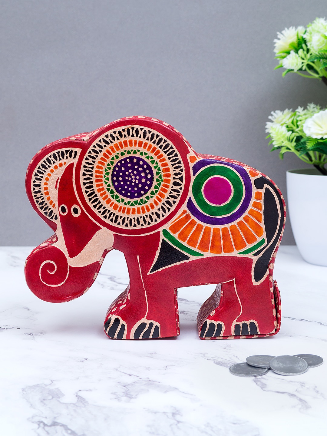 

Golden Peacock Pink & Orange Printed Elephant Shape Coin Box
