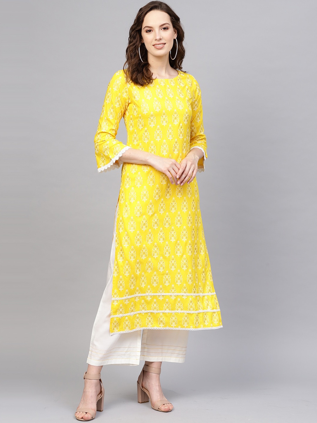 

Indo Era Women Yellow Woven Design Kurta with Trousers
