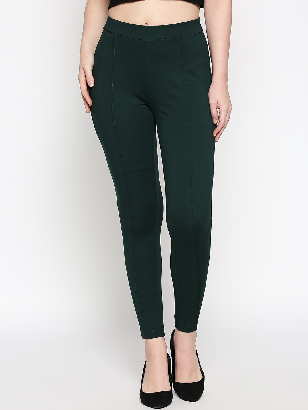 

People Women Green Solid Treggings