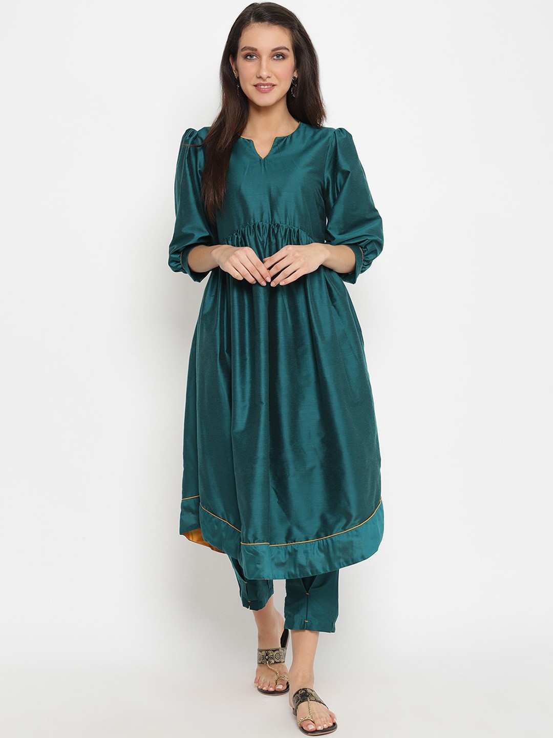 

Abhishti Women Green Solid Kurta with Trousers