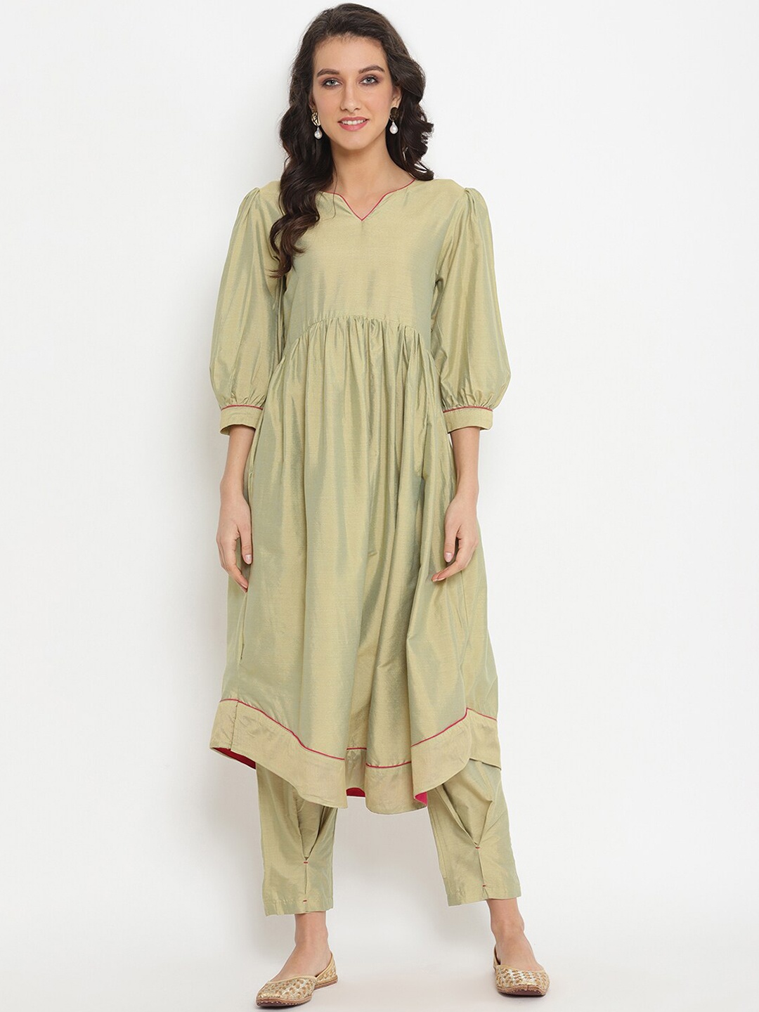 

Abhishti Women Green Solid Kurti with Trousers