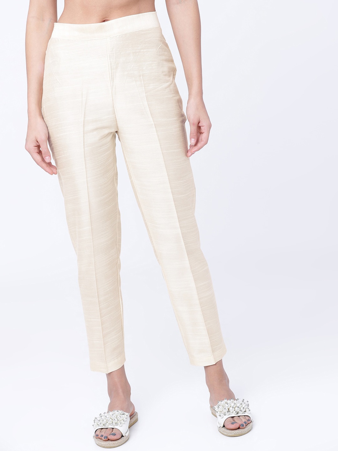 

Vishudh Women Cream-Coloured Regular Fit Solid Regular Trousers