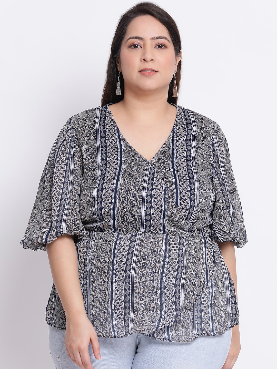 

Oxolloxo Women Navy Blue Printed Empire Top