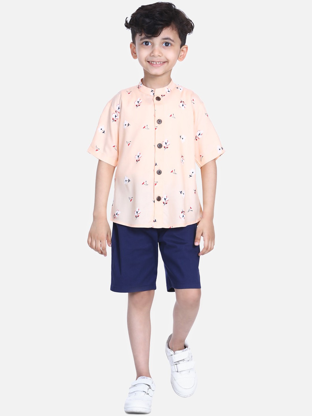 

Cutiekins Boys Peach-Coloured & Blue Printed Shirt with Shorts