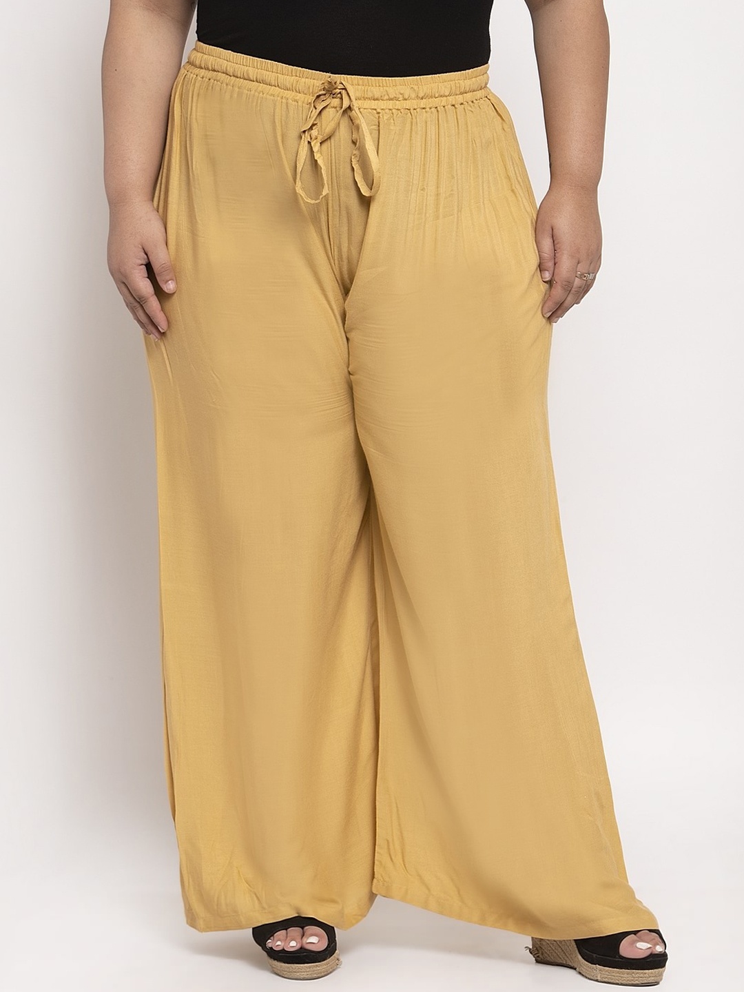 

TAG 7 PLUS Women Beige Solid Flared Palazzo