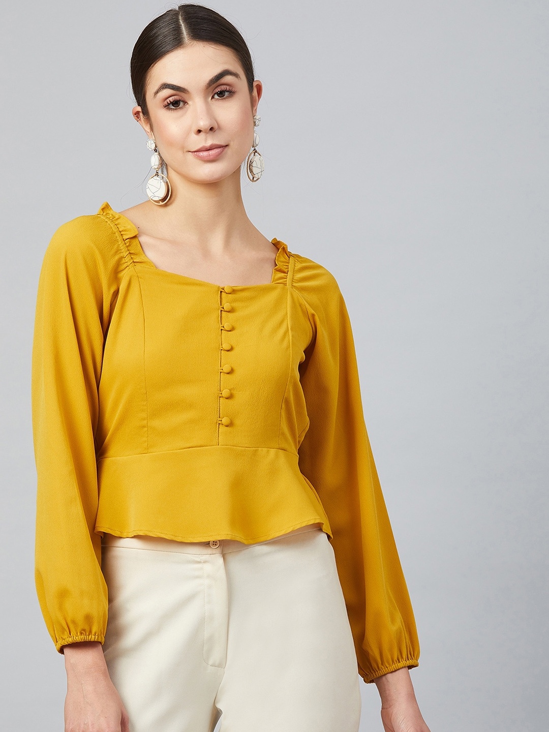 

RARE Women Yellow Solid Peplum Top