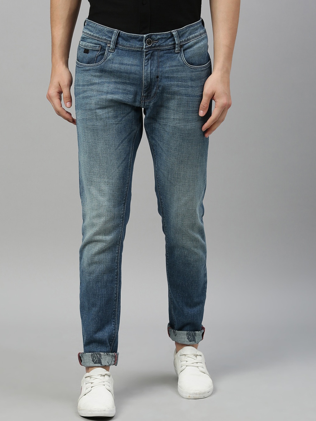 

RARE RABBIT Men Blue Tapered Fit Mid-Rise Low Distress Jeans