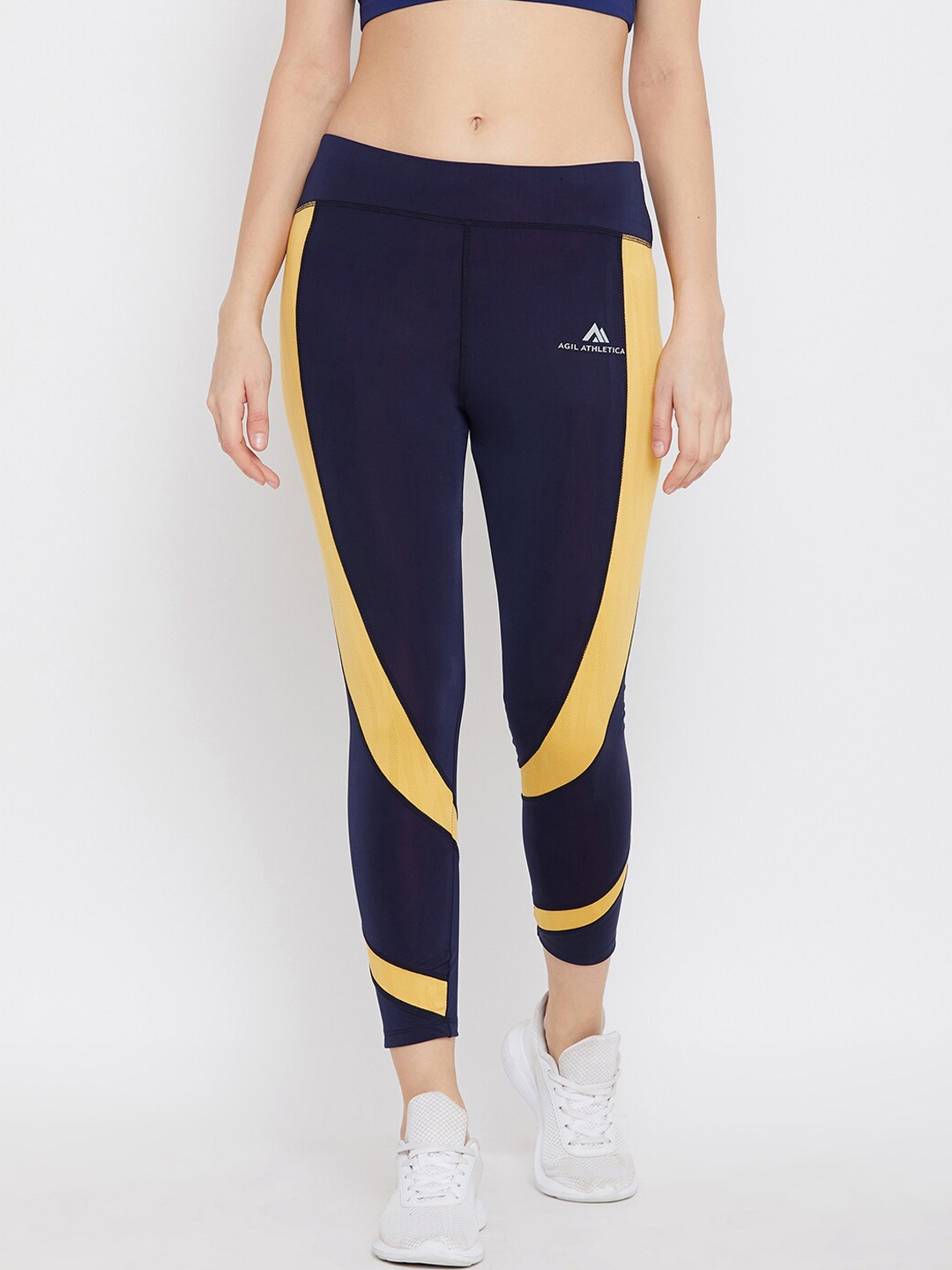 

AGIL ATHLETICA Women Blue & Yellow Colourblocked Rapid-Dry Tights