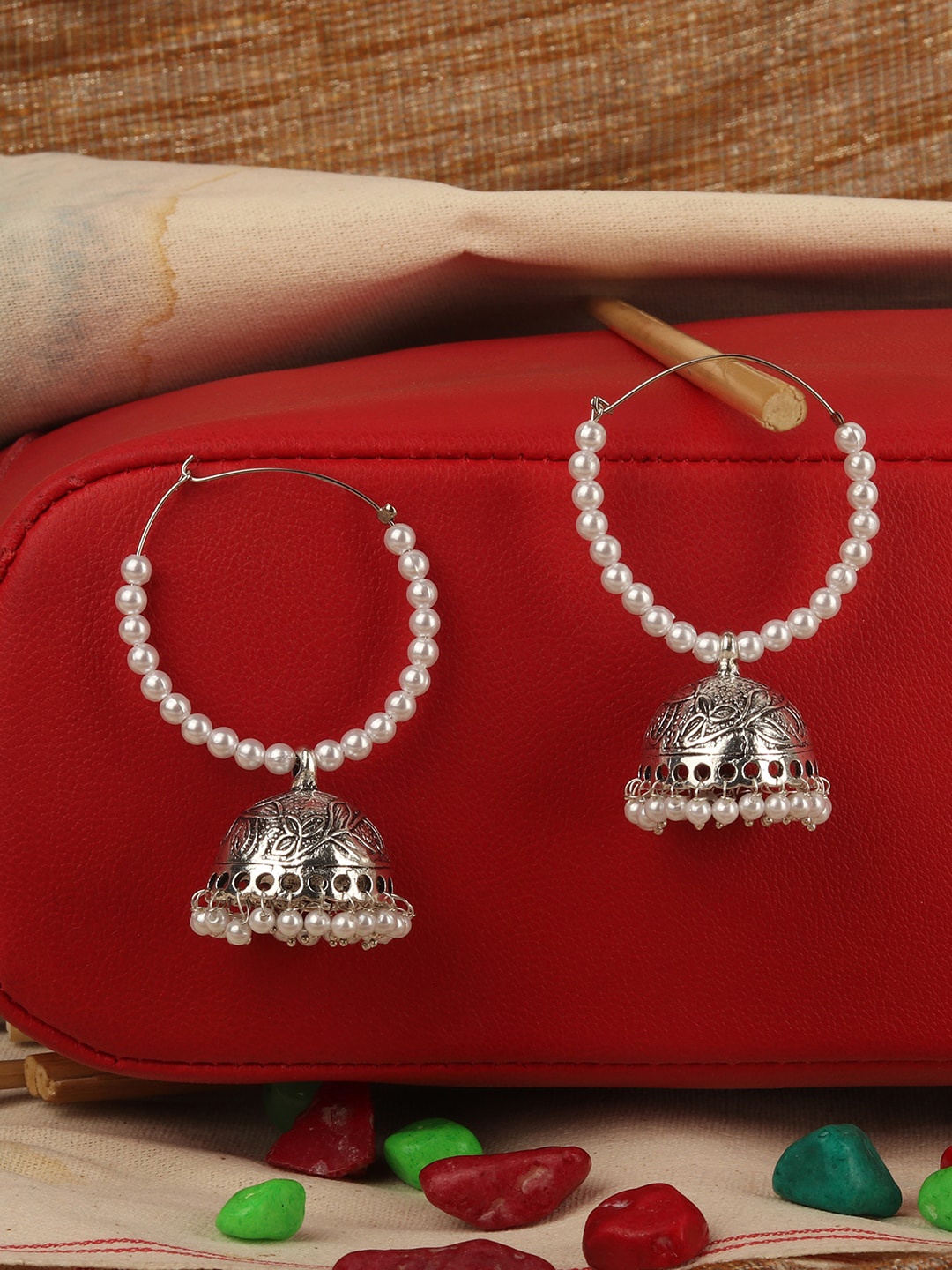 

ANIKAS CREATION Silver-Toned & White Contemporary Jhumkas