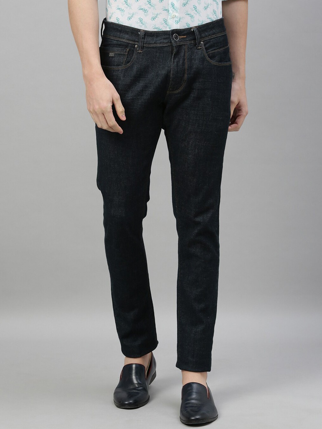 

RARE RABBIT Men Blue Tapered Fit Mid-Rise Slash Knee Jeans