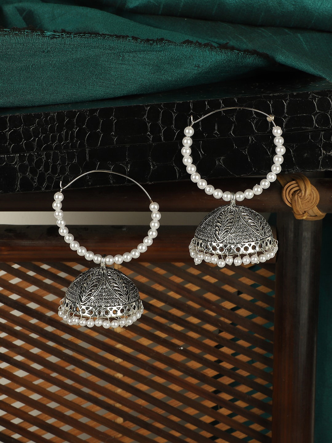 ANIKAS CREATION Silver-Toned & White Contemporary Jhumkas