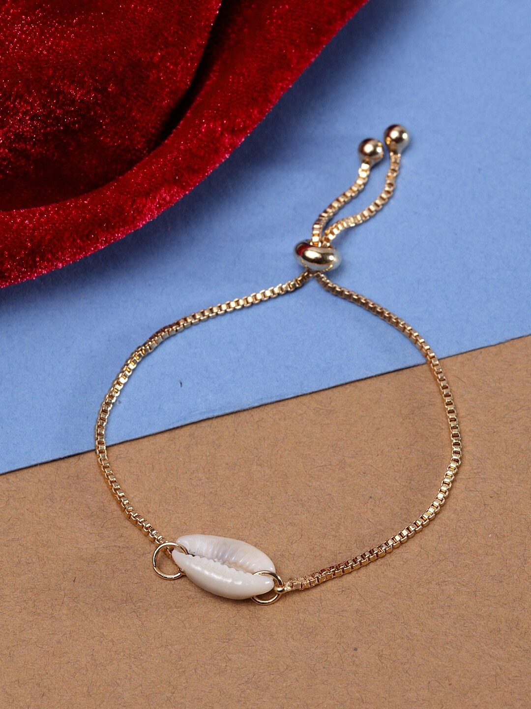 

Ferosh Gold-Toned & White Shell Charm Bracelet