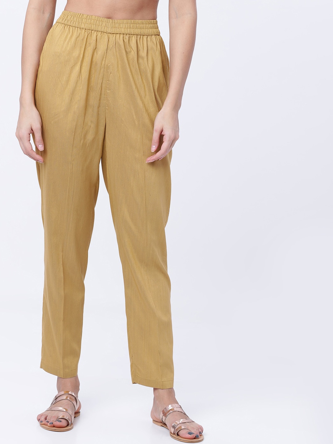 

Vishudh Women Beige & Gold-Toned Regular Fit Solid Regular Trousers