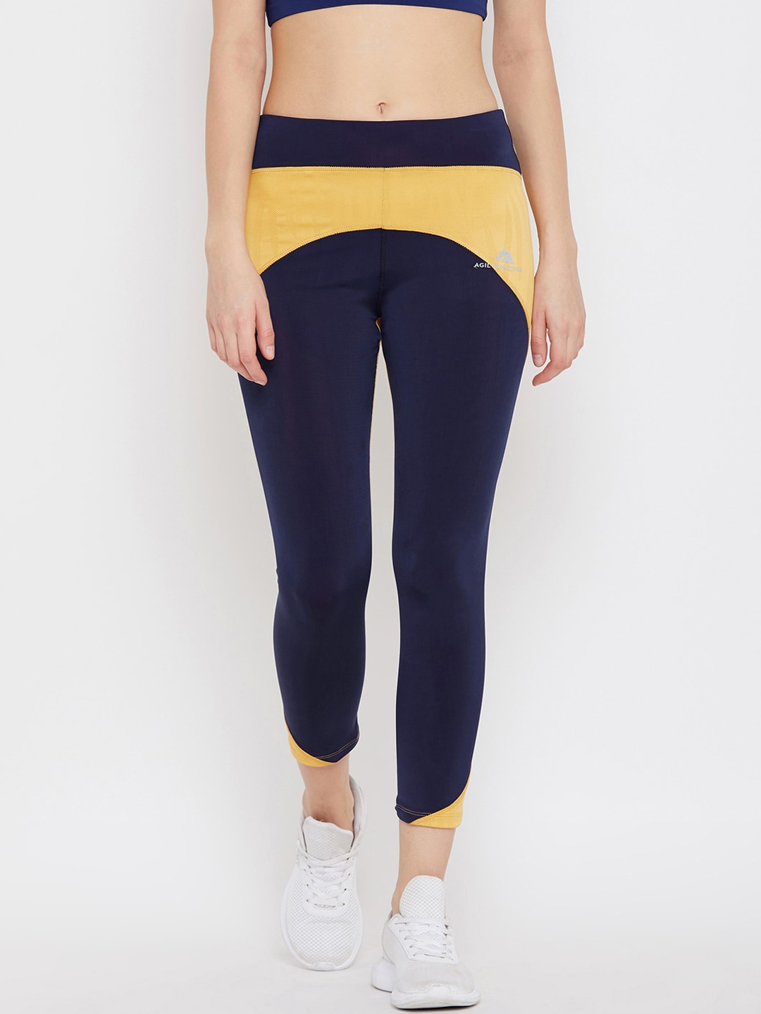 

AGIL ATHLETICA Women Blue & Yellow Colourblocked Rapid-Dry Tights