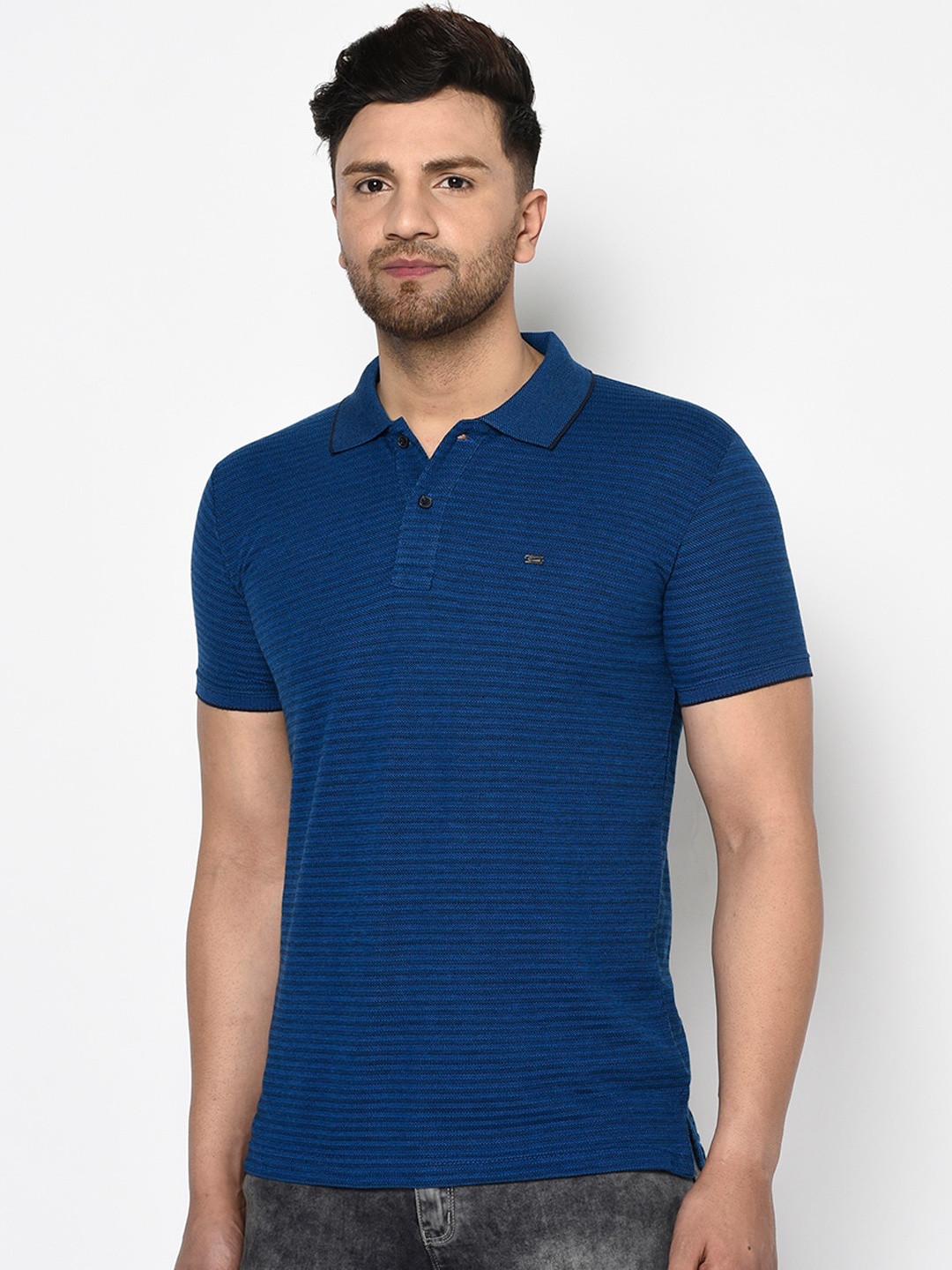 

Duke Men Blue Self Design Polo Collar T-shirt