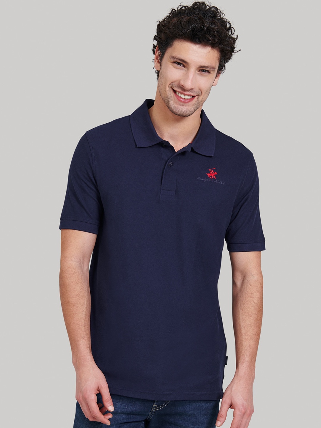 

Beverly Hills Polo Club Men Navy Blue Solid Polo Collar T-shirt