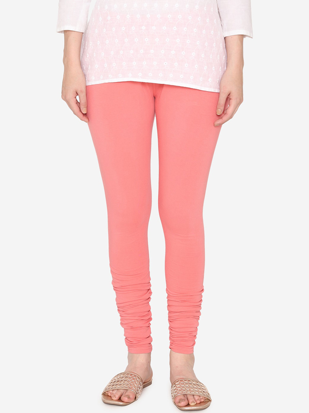 

Vami Women Peach-Coloured Solid Stretchable Churidar Leggings