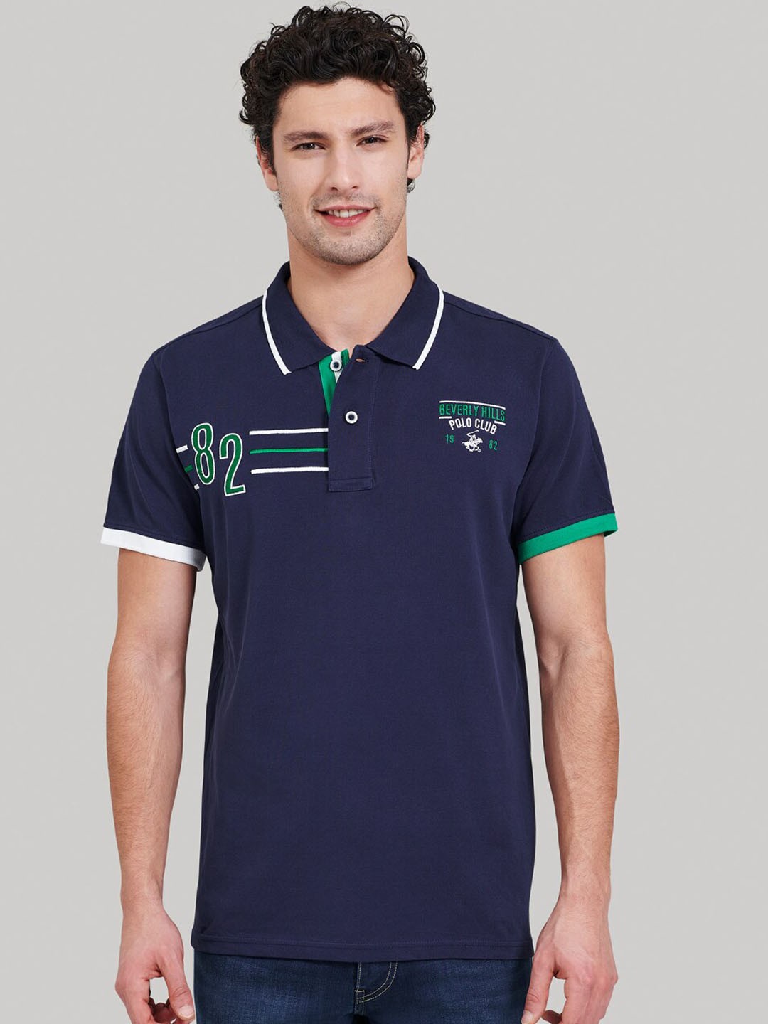 

Beverly Hills Polo Club Men Navy Blue Solid Polo Collar T-shirt
