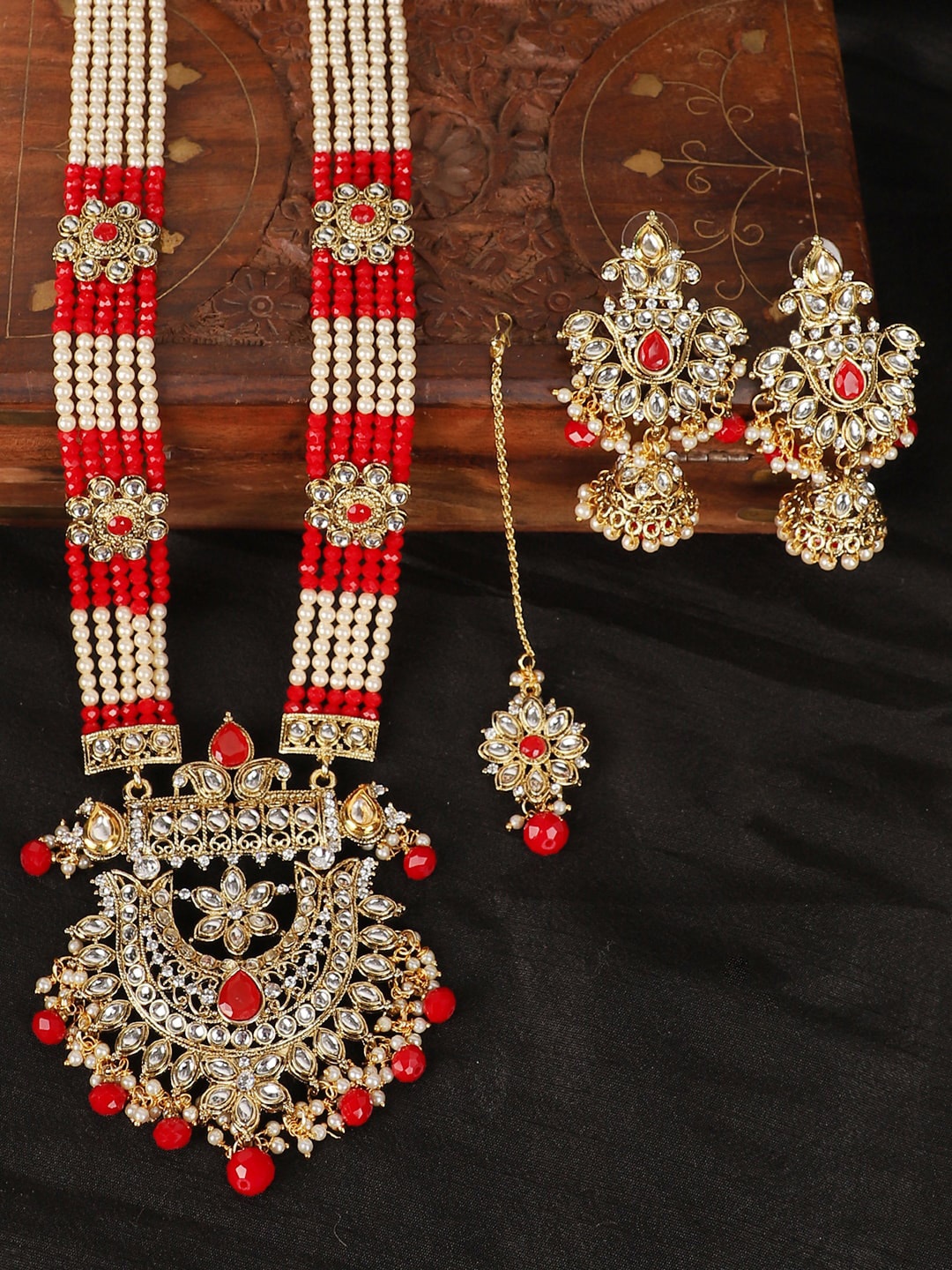 

ANIKAS CREATION Gold Plated Red & White Pearl Beaded & Red & White Kundan Studded Jadau Jewellery Set