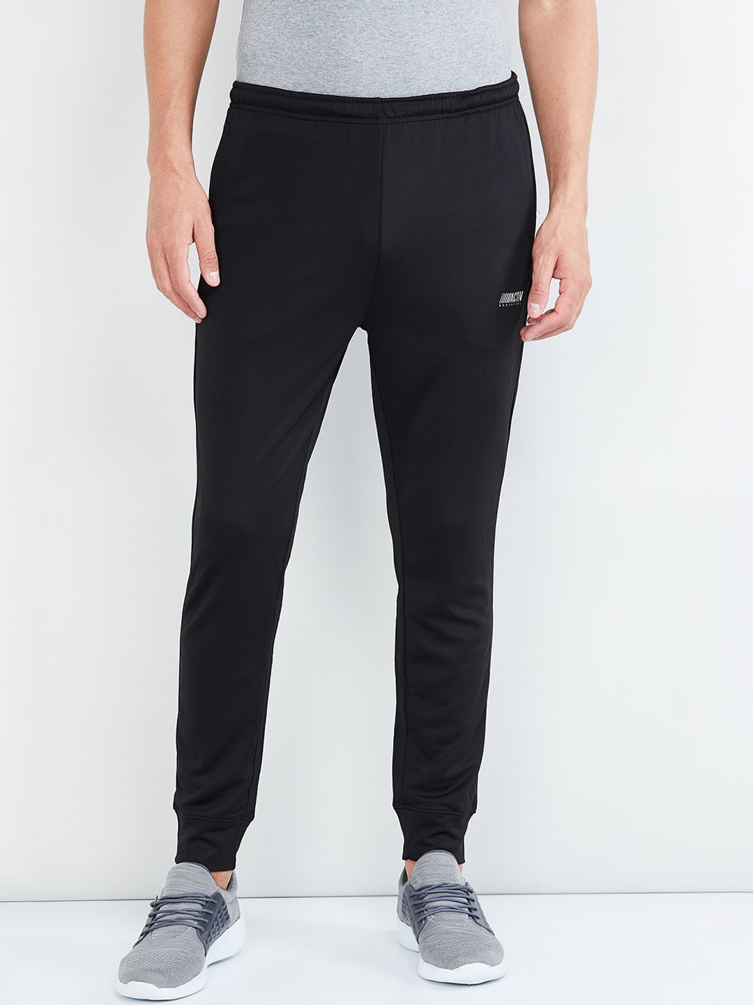 

max Men Black Solid Joggers
