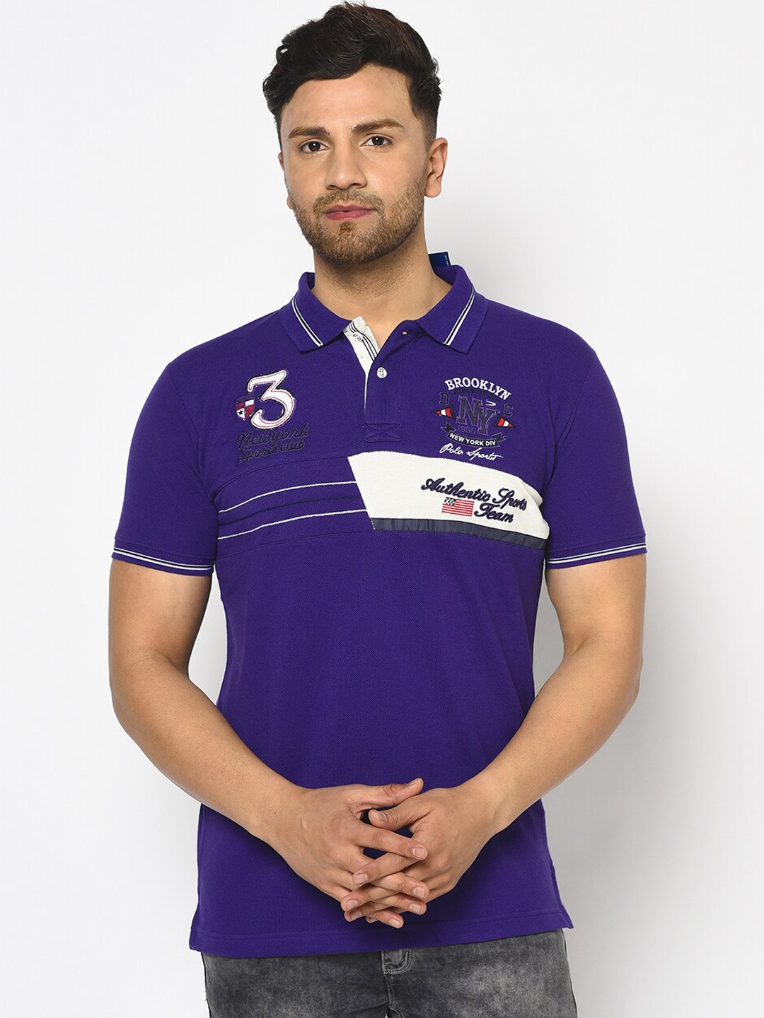 

Duke Men Purple Solid Polo Collar T-shirt