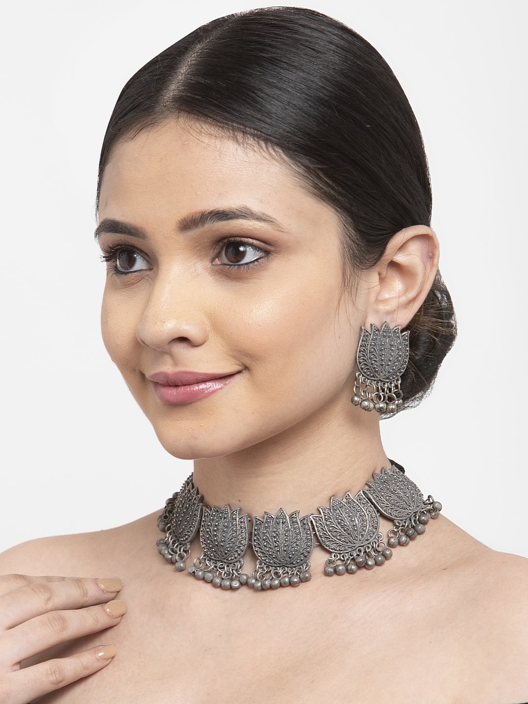 

Moedbuille Oxidized Metallic-Toned & Black Ghungroo Studded Antique Design Tribal Temple Jewellery Set