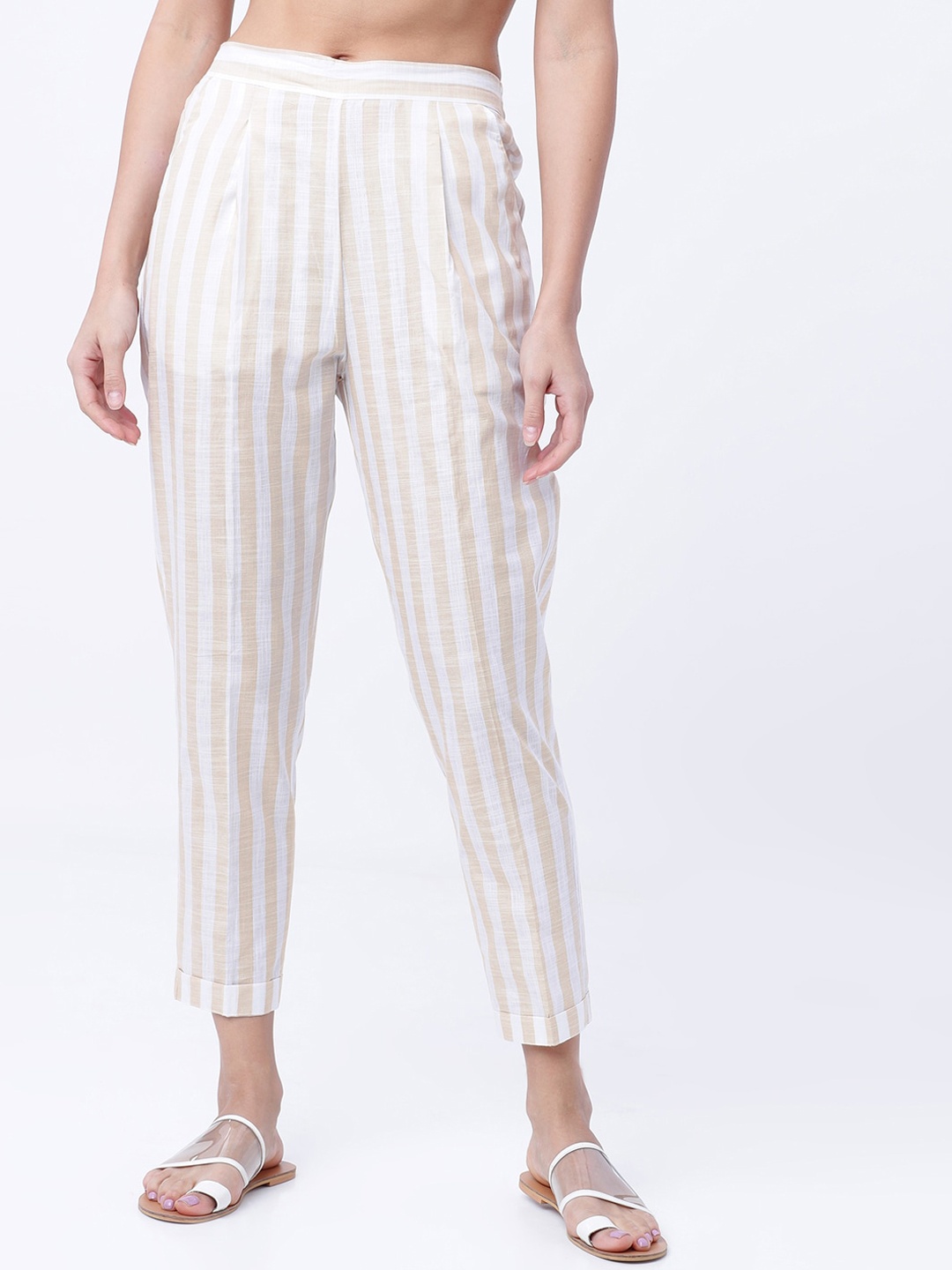

Vishudh Women Beige & White Striped Slip On Trousers