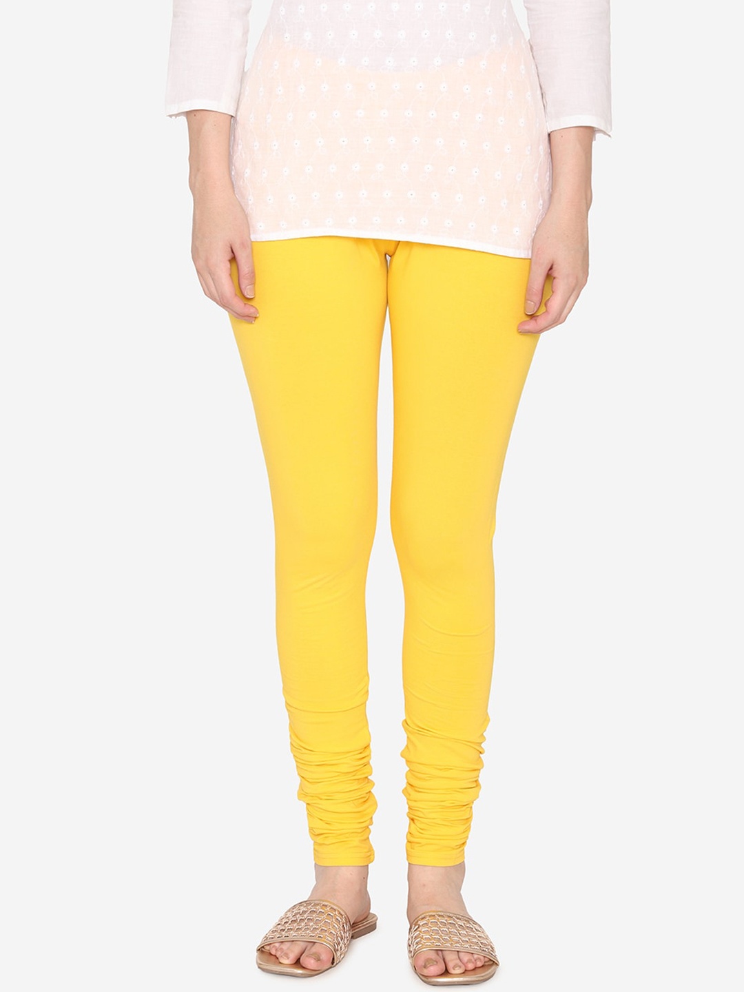 

Vami Women Yellow Solid Churidar-Length Leggings