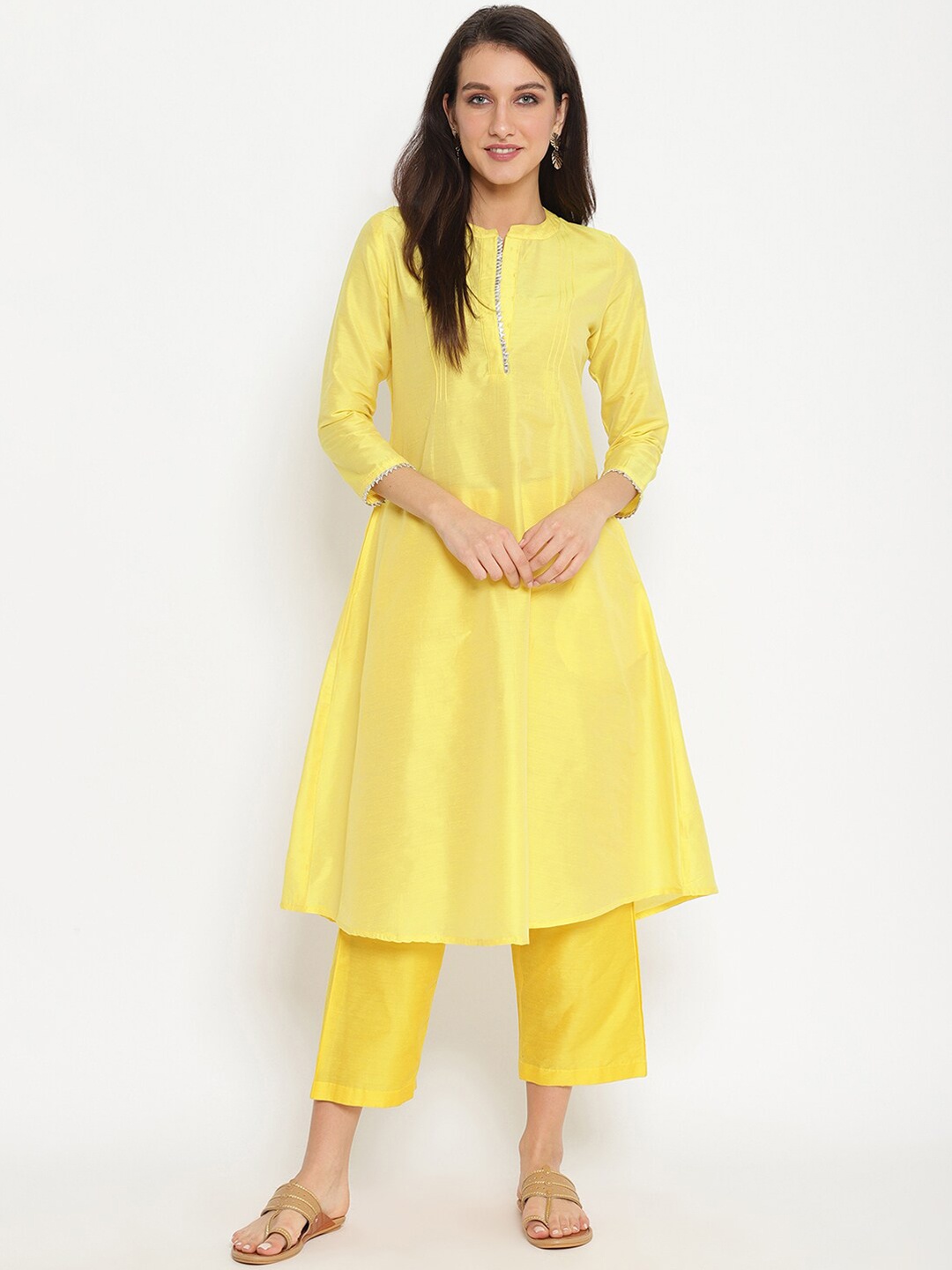 

Abhishti Women Yellow Solid A-Line Kurta