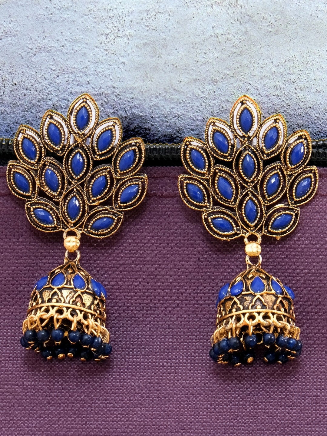 

Crunchy Fashion Blue & Gold-Plated Peacock Shaped Jhumkas