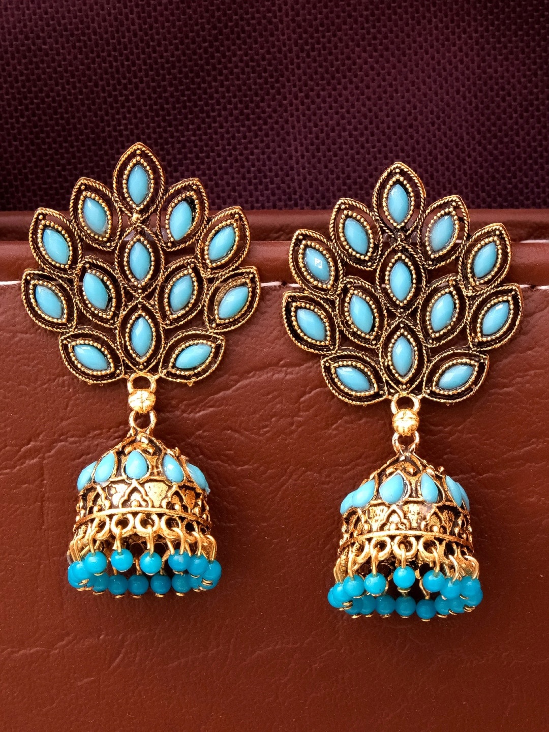 

Crunchy Fashion Blue & Gold-Toned Dome Shaped Jhumkas