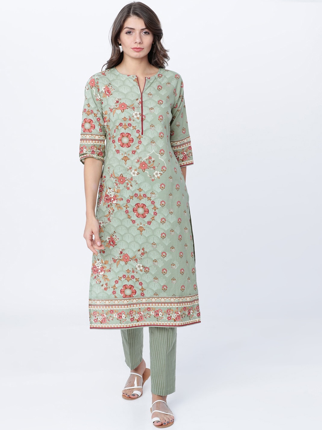 

Vishudh Women Green Printed Kurta with Trousers