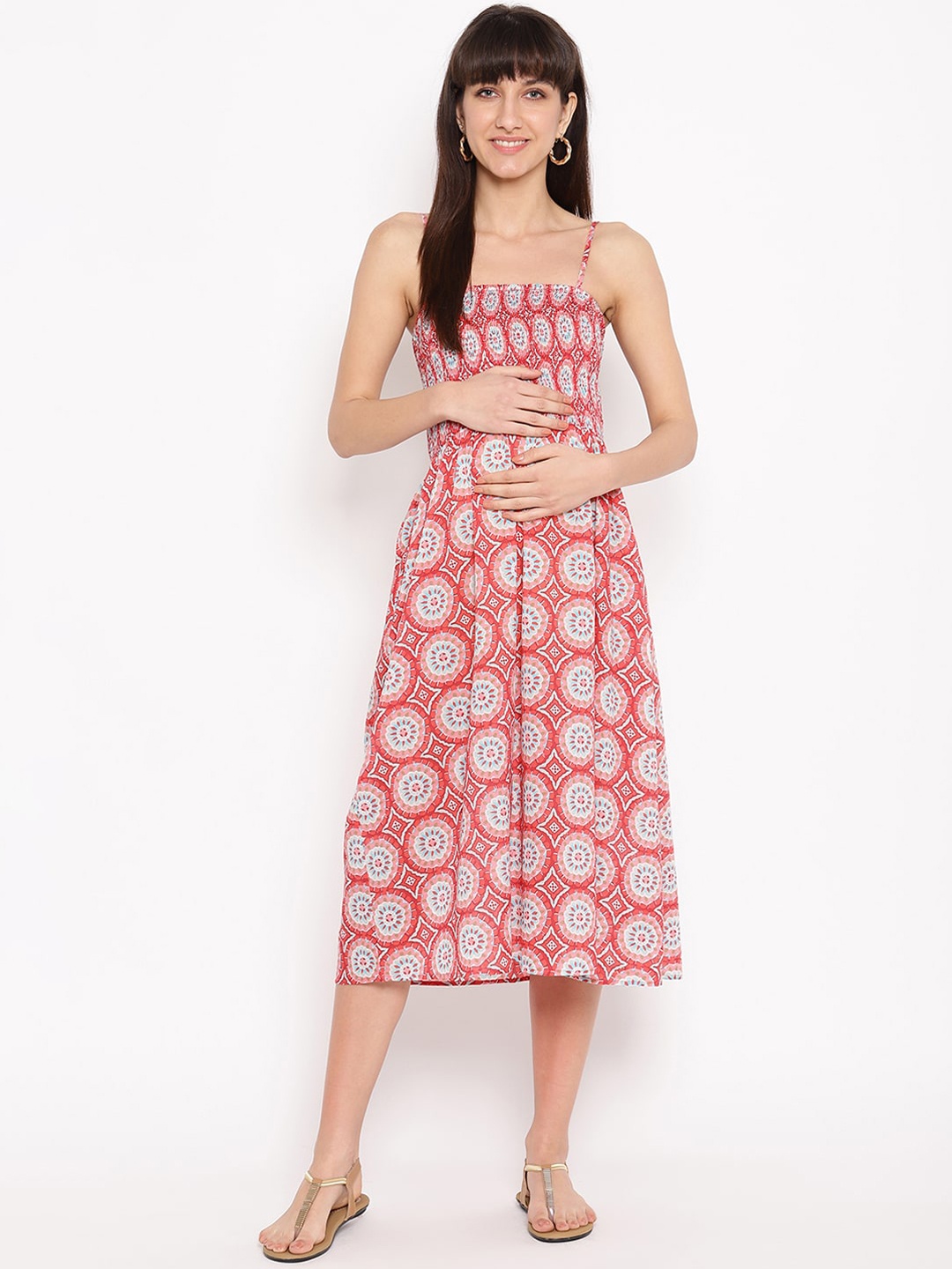 

The Vanca Women Orange Printed Fit and Flare Maternity Dress