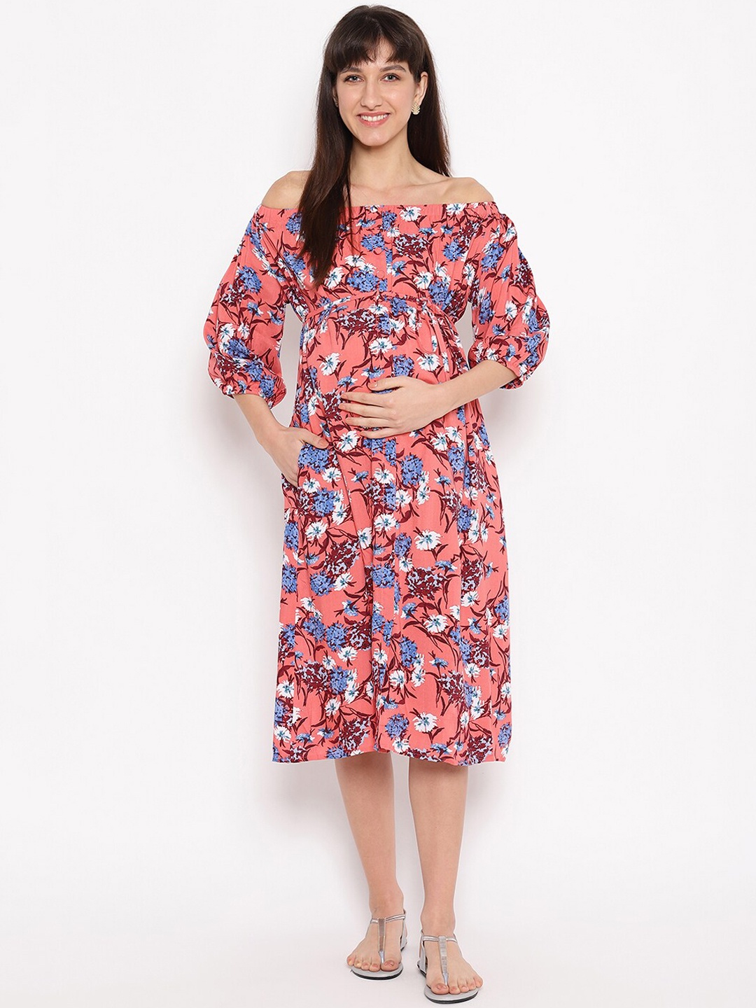 

The Vanca Women Peach-Coloured Printed Fit and Flare Maternity Dress
