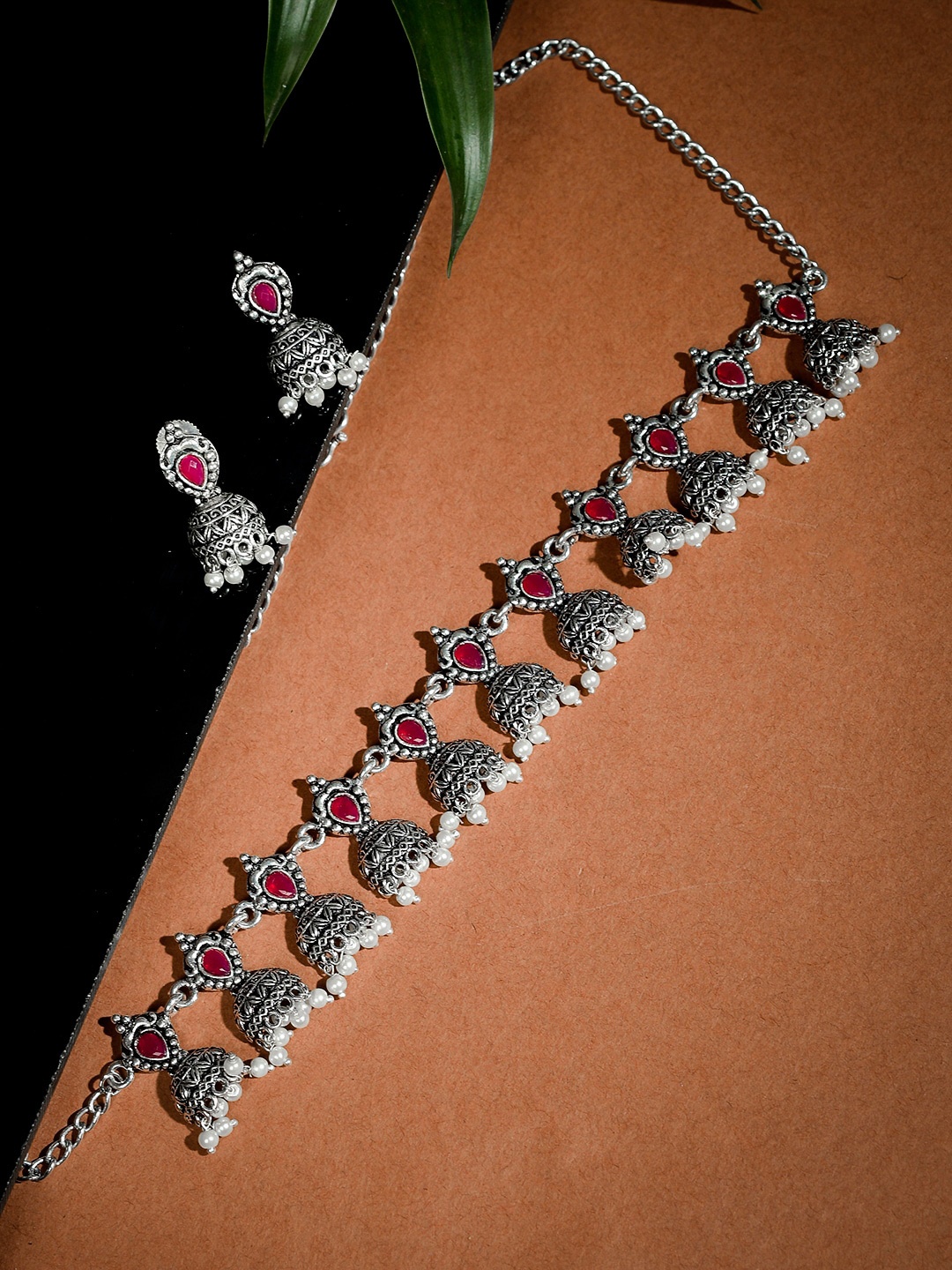 

Silvermerc Designs Oxidised Silver-Plated Pink Stone-Studded Jhumka-Shaped Handcrafted Jewellery Set