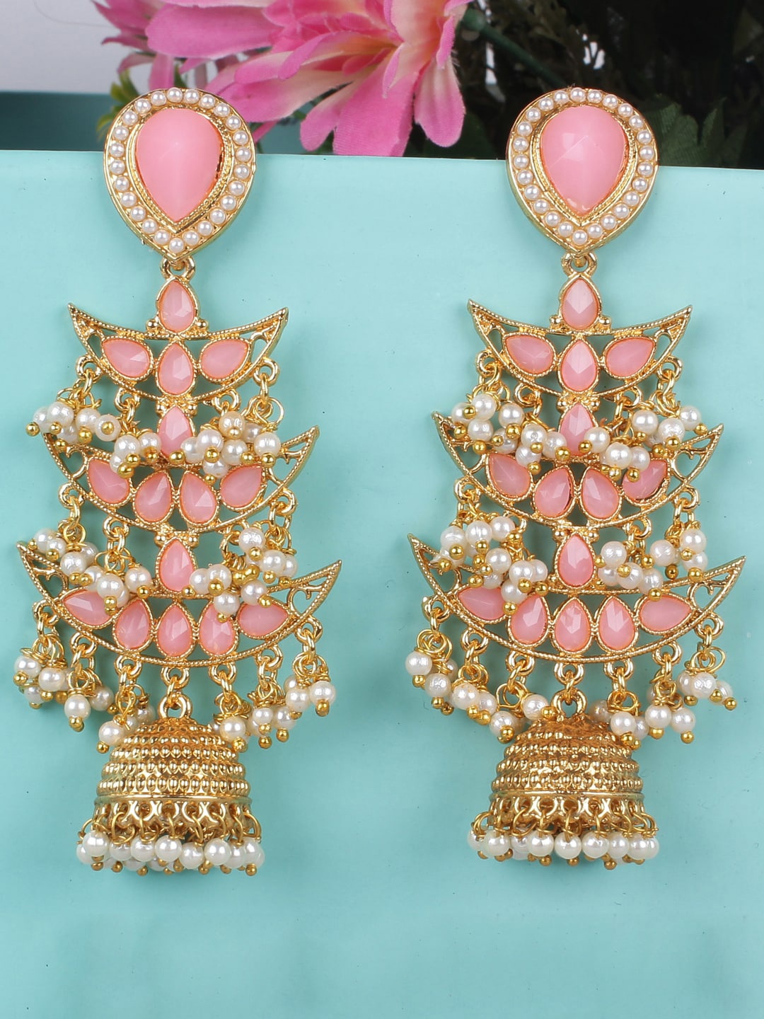 

Shining Diva Pink Crescent Shaped Jhumkas