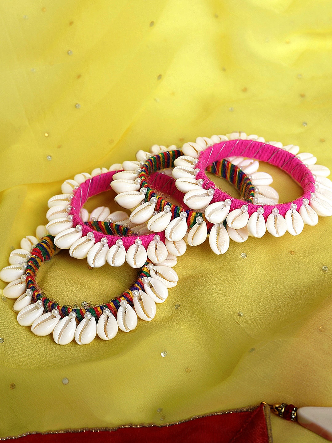 

Yellow Chimes Set Of 4 Pink & White Handcrafted Thread Work Shell Bangles