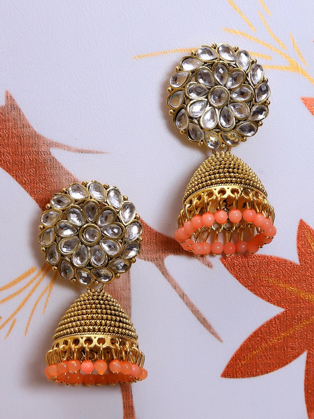 

Crunchy Fashion Gold-Toned & White Dome Shaped Jhumkas